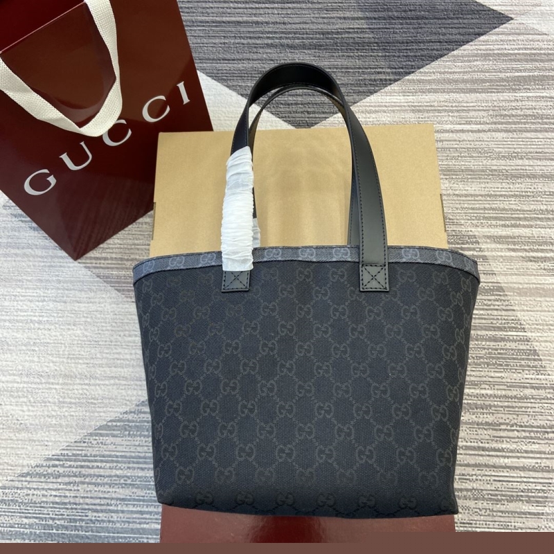 G*u*i shopping bags